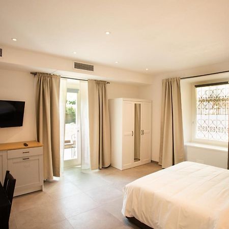 Alpencity Suites Тренто Экстерьер фото