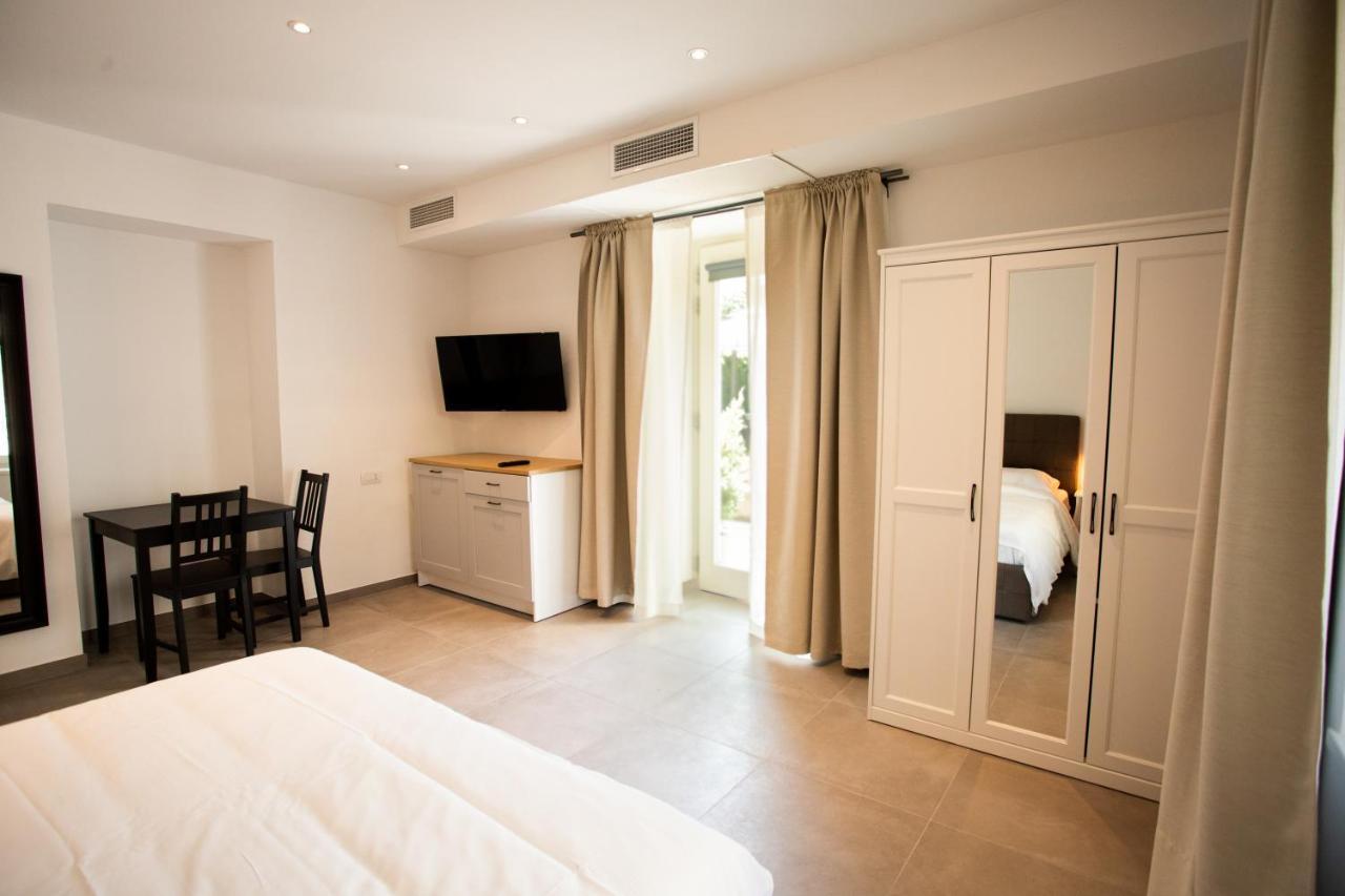 Alpencity Suites Тренто Экстерьер фото