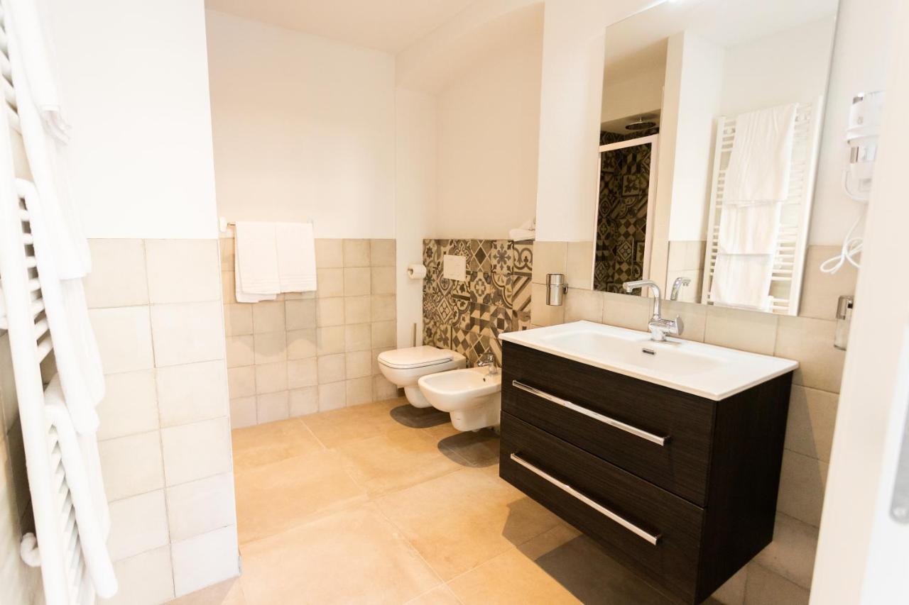 Alpencity Suites Тренто Экстерьер фото