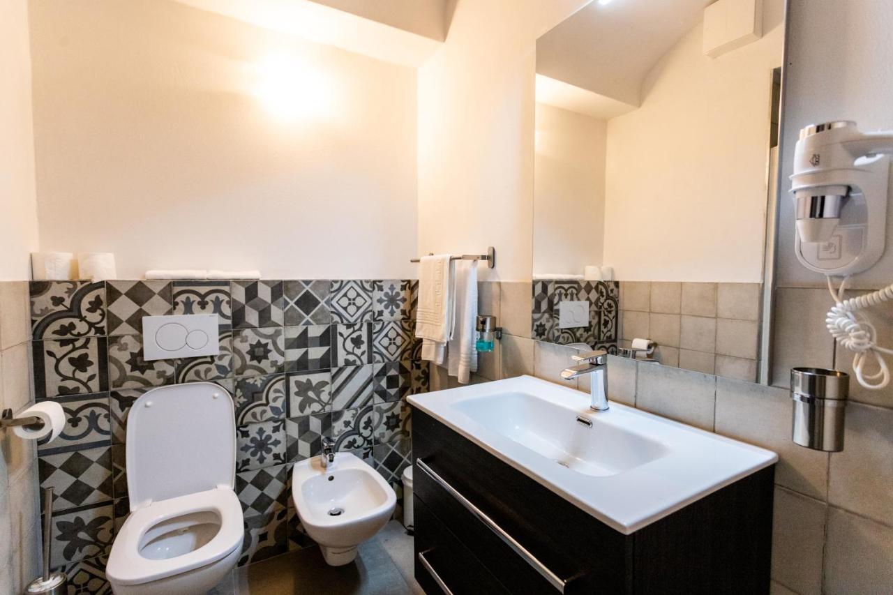 Alpencity Suites Тренто Экстерьер фото