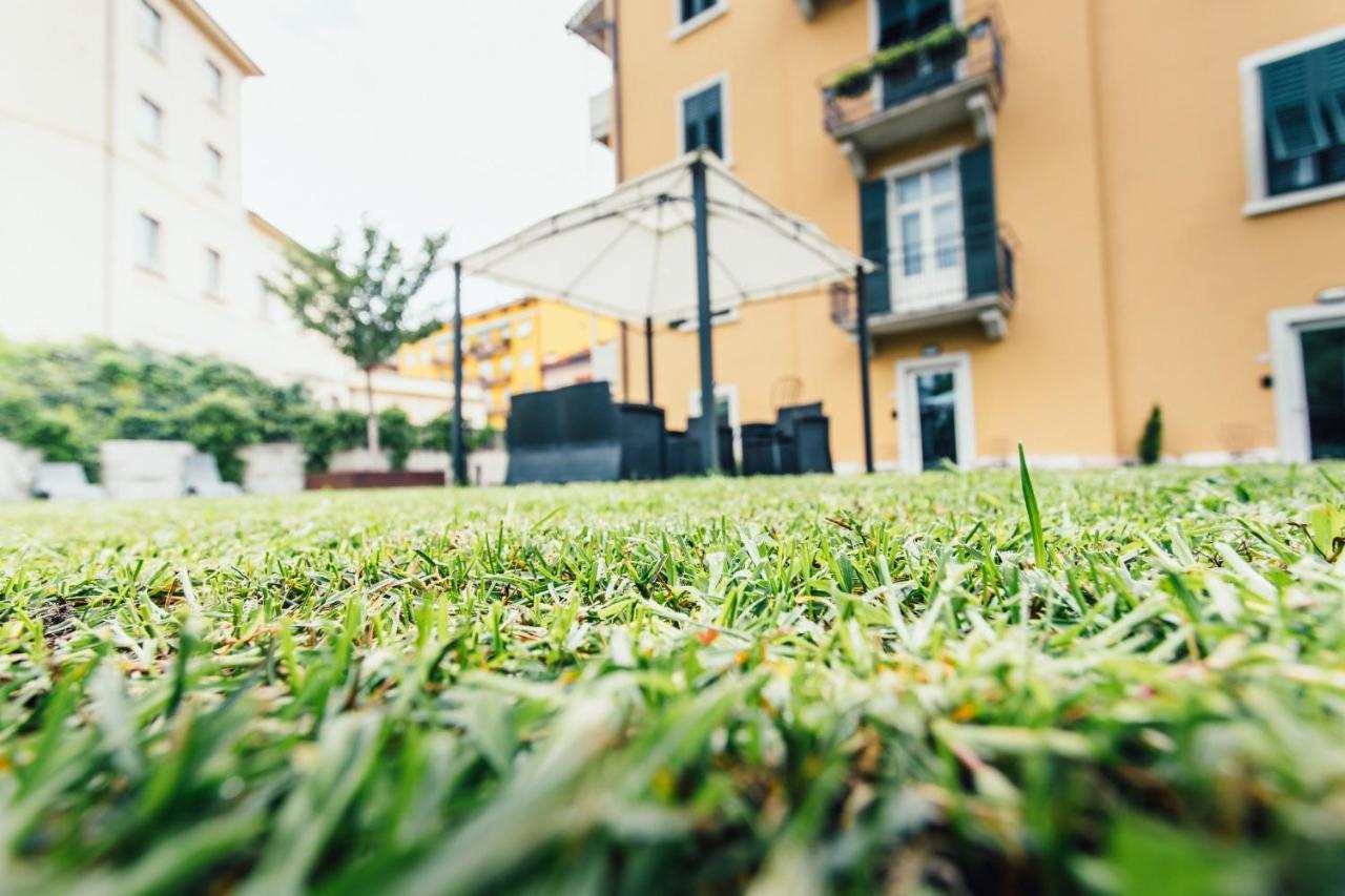 Alpencity Suites Тренто Экстерьер фото